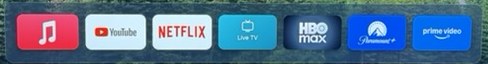 Close-up of the finished dock: wide rounded cards for Music, YouTube, Netflix, Live TV, HBO Max, Paramount+ and Prime Video